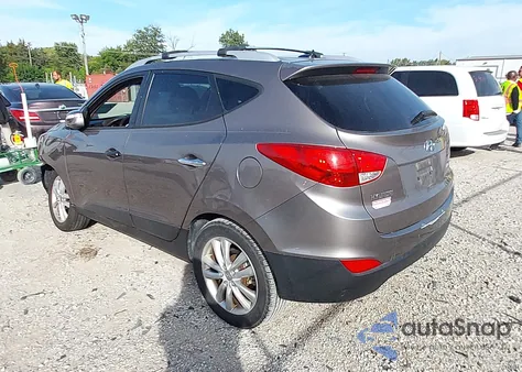 2013 Hyundai Tucson Limited z USA, uszkodzony, nr VIN KM8JUCAC4DU621111